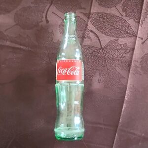 Empty Coke Cola glass bottle from Mexico